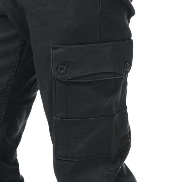Pantalones cargo ajustados para hombre Jack Jones Paul Warner en negro. - Cierre de botón. - Bolsillos laterales. - Bolsillos con botón en la parte trasera y en las piernas. - Lavado enzimático ecológico que proporciona un aspecto desgastado. - Prenda de tejido de sarga con elasticidad. - Marca en la parte trasera. - Puños acanalados. - Ajuste entallado. - Material principal: 98% algodón 2% elastano. Lavable a máquina. - Ref: 12167596