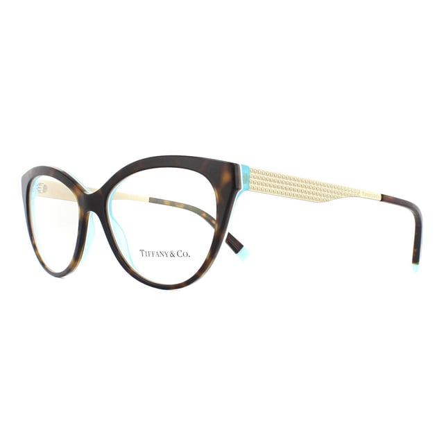 Tiffany Glasses Frames TF2180 8275 Havana Crystal Blue 54mm are a gorgeous butterfly design with an acetate front and temple tips and slender flat metal Diamond Point temples. Flashes of Tiffany blue at the temple tips provide brand recognition.