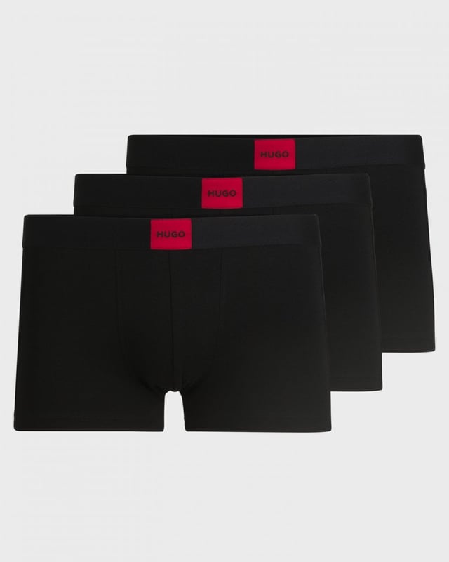 Three pairs of signature trunks in stretch jersey by HUGO Menswear. Each regular-rise pair has a HUGO logo patch on the waistband.

Packaging: Box
Exposed waistband
Regular rise

Quality: 95% Cotton, 5% Elastane, Waistband: 52% Polyamid, 33% Polyester, 15% Elastane
50532797