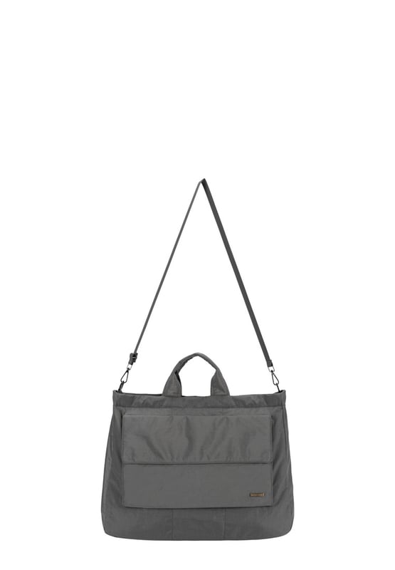 The Landscape Nylon Tote is the perfect commuter bag. With ample internal space and an oversized flap over zip pocket to the front, the bag features a comfortable padded carry handle and adjustable crossbody strap with clip off function. Features: , Zip top opening, Front oversized flap over zip pocket, Rear zip pocket, SMITH & CANOVA antique brass logo, Branded antique brass zips, Padded grab handle, Adjustable crossbody strap (detachable), Internal 15 inch padded laptop sleeve, Internal zip pocket, 2 Internal mobile phone slip pockets - fits normal and plus size smart phones, 3 Internal pen slip pockets Style Ref: 92683 DKGREY