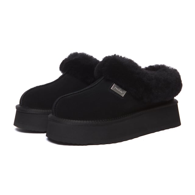Stay snug and stylish in the timeless Topknot Ankle Slippers, the latest essential footwear with a trendy platform design. Crafted in five chic colour options, these slippers envelop your feet in luxurious sheepskin wool, offering irresistible comfort. Complete with a fluffy wool ankle collar, their enduring charm ensures they remain in vogue across seasons.

Product No. EAU2017

Description:
- Cow Suede Upper
Sheepskin Wool Insole and Lining
- EVA Sole