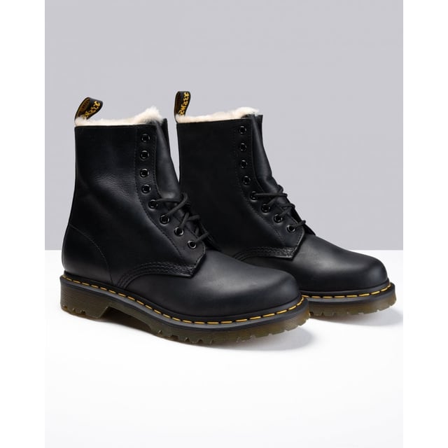 This is a winter twist on the classic Dr. Martens 8-eye boot. The Serena has the extra-tough, durable sole: chunky grooves with bars and stars underneath for solid footing. Even better? It&rsquo;s lined with soft, rich artificial white fur. Original Doc DNA is still intact, though— like yellow stitching, grooved sides, and heel loop. Winter never saw it coming.
The Serena is constructed on the iconic air-cushioned sole, that's oil-and-fat resistant with good abrasion and slip resistance—and has been since 1960. This shoe is Goodyear-welted, meaning the upper and sole are sewn together in heat-sealed z-welt stitch. It&rsquo;s made with Burnished Wyoming, a leather with a subtle grain and an oily surface, treated for an antique look.
21797001