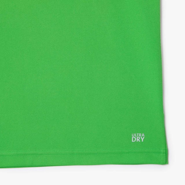 Lacoste Tennis x Novak Djokovic Ultra-Dry Polo Shirt.- Recycled polyester made from manufacturing offcuts.- Regular fit, straight cut.- Contrast sides.- Tested by tennis players.- Silicone crocodile on chest. Material: 100% Polyester. Ref: DH7330IXU.