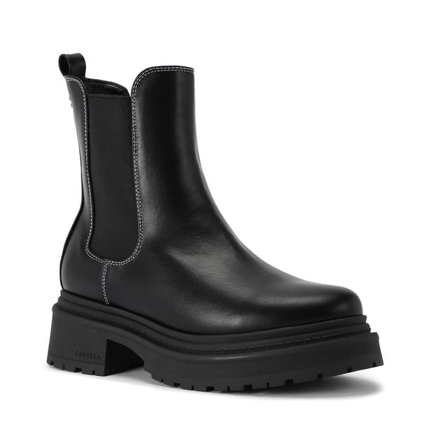 This Collide is a Chelsea boot elevated with chunky black sole. The upper is accented with white stitching and a silver Icon C stud at the back of the ankle.