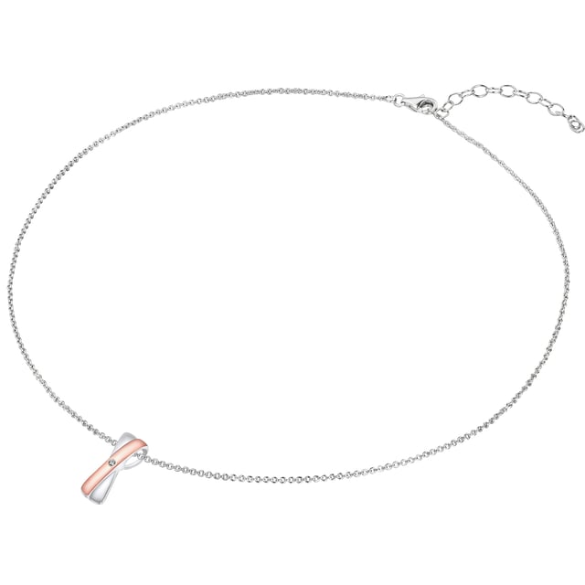 There is hardly any stronger proof of love than this timeless diamond necklace from Rafaela Donata. The chain itself consists of delicate anchor chains made of glossy -polished 925 sterling silver and can be easily opened and closed using the carabiner closure. Her rhodium -ily and partially rosé -gold pendant symbolizes two different people who have agreed with each other's eternal oath of love and appear as a strong unit. This impression is still being confirmed by the diamond placed in the middle, whose breathtaking beauty shines indefinitely.