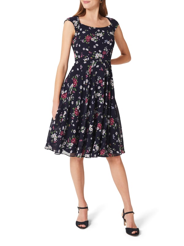 Any-occasion ready. Set against a navy base, painterly florals blossom across the Lauren dress, defined by a fit and flare silhouette and chic square neck.