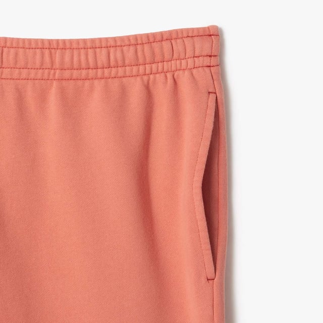 Washed Effect Lacoste Print Jogger Shorts Organic cotton fleece Regular fit  straight cut  Drawstring waist Contrast Lacoste print Embroidered crocodile on front Washed Effect Lacoste Print Jogger Shorts Organic cotton fleece Regular fit  straight cut  Drawstring waist Contrast Lacoste print Embroidered crocodile on front