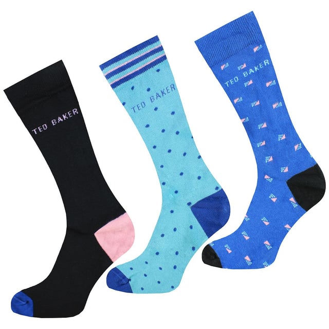 Introducing the Ted Baker Twotk 3-Pack of Men's Assorted Socks â€“ a vibrant and eclectic collection designed to infuse a playful touch into your sock drawer. Elevate your sock game with this carefully curated trio, showcasing Ted Baker's commitment to quality and contemporary design.

Key Features:

 Assorted Playful Designs:  The Twotk 3-Pack features a lively assortment of playful and eye-catching sock designs. From bold patterns to quirky motifs, this collection allows you to express your personality and add a pop of color to your everyday wardrobe.

 High-Quality Material Blend:   Crafted from a premium blend of materials, including cotton and elastane, these socks offer a soft, breathable, and stretchy fit. The combination ensures comfort throughout the day, making them suitable for various activities.

 Colorful and Eclectic Palette:   The assorted designs are complemented by a vibrant and eclectic color palette. From bright hues to more subdued tones, these socks bring a burst of energy to your everyday style, allowing you to stand out with confidence.

 Comfortable and Supportive Fit:   The Twotk socks are designed with comfort in mind. The snug yet gentle fit, along with added support in key areas, ensures that your feet feel pampered and well-supported, whether you're on the move or taking it easy.

 Versatile Style Options:   With a diverse range of designs and colors, these socks effortlessly transition between casual and more formal settings. Mix and match according to your outfit or mood, showcasing your unique sense of style.

 Durable Construction:   Ted Baker's commitment to quality is evident in the durable construction of the Twotk socks. Crafted to withstand the rigors of daily wear, these socks are a reliable choice for the modern man who values longevity in his essentials.