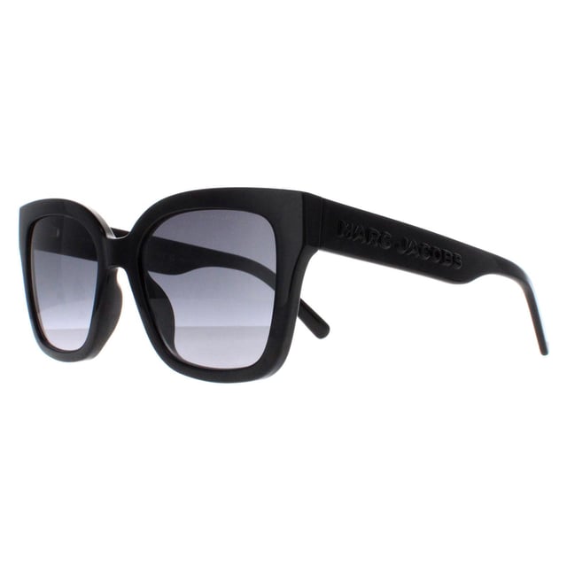 Marc Jacobs Square Womens Shiny Black Dark Grey Gradient MARC 658/S  Sunglasses feature a sleek and contemporary design with a nod to timeless style. Crafted with meticulous attention to detail, the frame showcases a blend of modern lines and classic elements, complemented by high-quality materials that promise both durability and comfort. The lenses not only offer optimal protection against harmful UV rays but also contribute to the sunglasses' undeniable allure. Finished with the iconic Marc Jacobs branding, these sunglasses effortlessly merge fashion forward aesthetics with everyday functionality, becoming an essential accessory for those who appreciate tasteful design and impeccable quality.