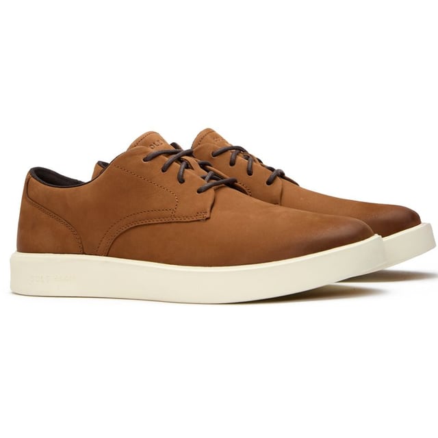 Mens tan Cole Haan grand crosscourt daily shoes, manufactured with nubuck and a rubber sole. Featuring: grand 360 sole, cole haan branding, lightweight and padded heel collar.