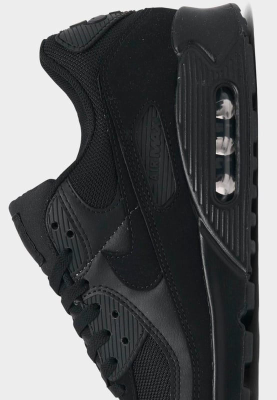 Step up your sneaker game when you step out in the classic Men's Nike Air Max 90 Casual Shoes. Low top silhouette with padded collar and tongue for comfort. - - . Retro runner turned lifestyle sneaker design. - - . Textile upper with synthetic and leather overlays. - - . Nike Max Air unit in heel for support and cushioning. - - . Flexible sole design encourages a more natural stride. - - . Rubber outsole with waffle traction pattern. - - . The Nike Air Max 90 is imported.
