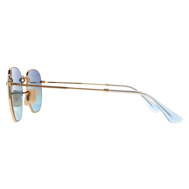 Ray-Ban Sunglasses Hexagonal RB3548N 91233M Gold Blue Grey Gradient are a very unique hexagonal shaped frame and feature the latest flat crystal lenses for a updated version of the classic metal round sunglasses. Super thin temples and coined profile to the frame finish the modern fashionable look.