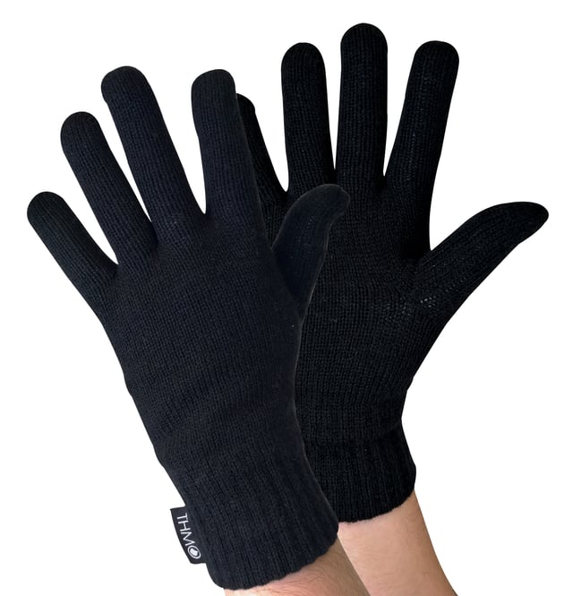 Sometimes a pair of gloves or a comfy hat just isn’t enough to keep the cold out which is why we’ve decided to combine our super warm Thinsulate lined THMO Hat & Gloves into the ultimate thermal set! Below are some more details about each part of the set: Men’s THMO Beanie The hat has a turnover cuff, so you can wear the hat cuff turned over or you can straighten the hat out to give you some extra length. On the cuff is the black THMO badge stitched into the front of the hat. The cuff also hugs the side of your head firmly so that heat can not escape though the sides. Men’s THMO Gloves The inner lining is made with 3M Thinsulate lining. Thinsulate is well known for keeping your hands warm and is considered one of the most effective linings. The ribbed cuff on the gloves is tight enough to stop the warm air escaping but not too tight to be uncomfortable. The THMO logo badge also hangs from the cuff, separating your glove fashion from the rest. Both hat and gloves in this set are made from 100% acrylic. Acrylic is one of the best man-made fibres that is especially designed to keep you warm, whilst also possessing a soft touch. It is also a good thermal insulator, holding warm air close to your body and trapping the heat that is generated by your body. This set is available in Black and comes in 2 sizes: M/L & L/XL, are 100% Acrylic and are Machine Washable.