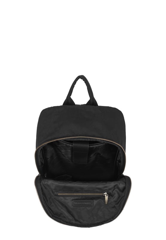 The Zip Around Nylon Backpack is the go-to bag for everyday essentials. The classic silhouette is cut in our signature nylon featuring a flap over zip pocket to the front. Inside features a 15” padded laptop sleeve with additional internal pockets for organised storage. Features: , Zip top opening, Front flap over zip pocket, Rear zip pocket, SMITH & CANOVA antique brass logo, Branded antique brass zips, Padded grab handle, Adjustable padded backpack straps, Internal 15 inch padded laptop sleeve, Internal zip pocket, 2 Internal mobile phone slip pockets - fits normal and plus size smart phones, 2 Internal pen slip pockets Style Ref: 92681 BLACK