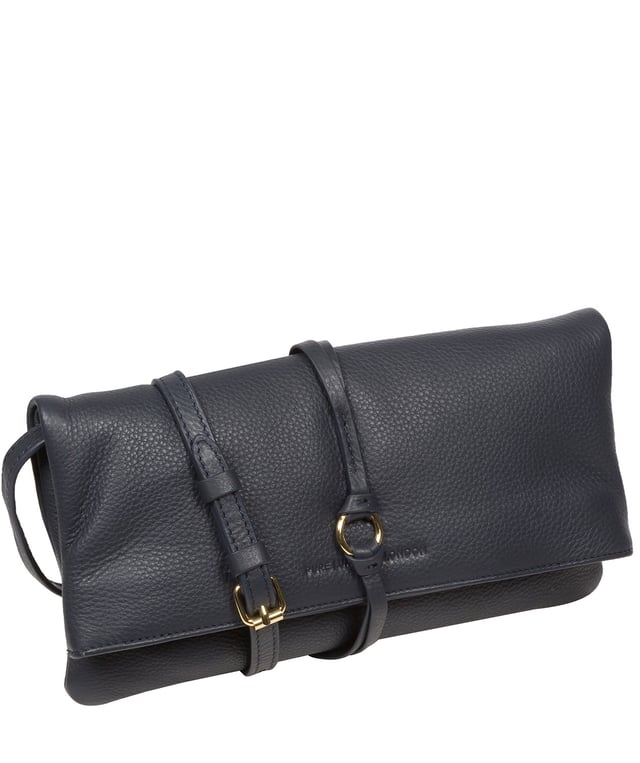 The 'Selene' cross body clutch bag from the Pure Luxuries Marylebone Collection is handcrafted from high-quality, genuine Nappa leather with a natural super-soft touch. The fold-over top secured by two magnetic press studs, opens to reveal a zipped main compartment and a slip pocket. The interior is lined with 100% cotton and includes two slip pockets to help maintain an organised bag. Comes with a matching and adjustable slim leather strap, with a maximum drop length of 65cm. The strap is also removable, transforming the bag into a clutch bag. Features gold-coloured metal fittings and zip. The Pure Luxuries logo is embossed for an effortless and sophisticated finishing touch.