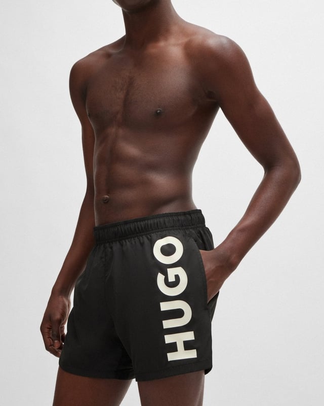 Modern swim shorts by HUGO. Designed in quick-drying fabric with full lining, this beach-ready pair features a vertical logo printed in contrast.
100% Polyester (recycled) , Lining: 100% Polyester
50513979