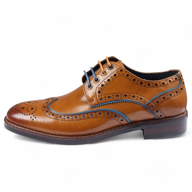 Elevate your formal style with the Justin Reess Simon Men's Brown Brogue Leather Shoes. These classic brogues feature decorative perforations and intricate detailing along the upper, adding a refined touch to any outfit. Made from premium leather, they offer durability and comfort for all-day wear. The lace-up closure ensures a secure, customizable fit, perfect for business meetings, weddings, and other formal occasions. These versatile shoes are a must-have addition to your wardrobe, seamlessly complementing any formal ensemble.

Classic Brogue Design with decorative perforations
High-Quality Leather Construction for durability and style
Lace-Up Closure for a secure, adjustable fit
Versatile Formal Wear suitable for various occasions