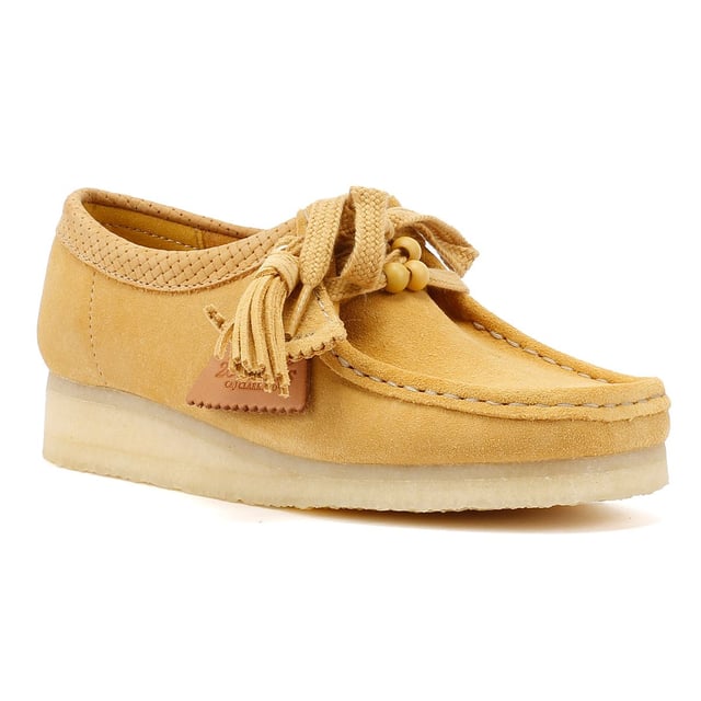 Launched in 1964, the moccasin-inspired Wallabee, with its clean and simple lines, has become an iconic Clarks design. Crafted from premium suede, it comes with a lace up fastening and distinctive contrasting crepe sole.