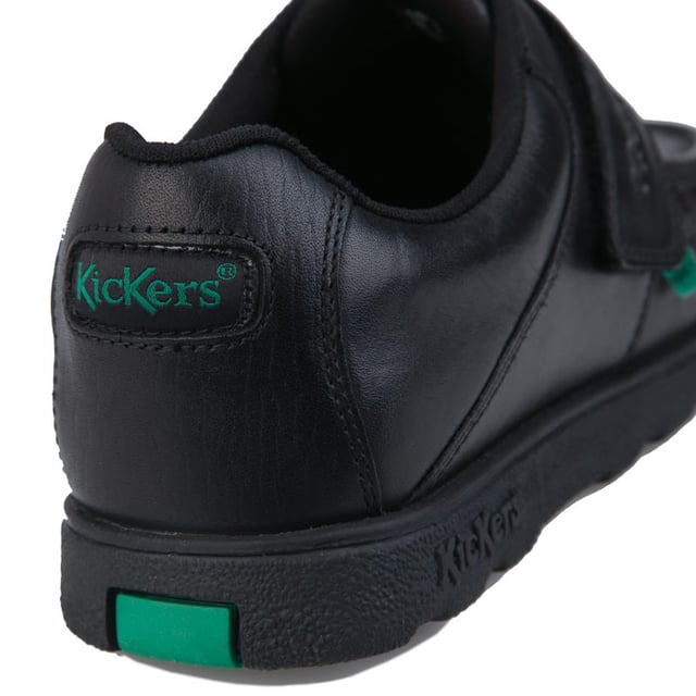 Junior Boys Kickers Fragma Strap Leather Shoe in black.- Moccasin style upper.- Touch and close double fastener. - Padded ankle collar. - Signature green logo tabs.- Kickers branding to the top strap.- Stitched detail.- Durable rubber outsole.- Leather upper  Textile lining  Synthetic sole. - Ref: 114863