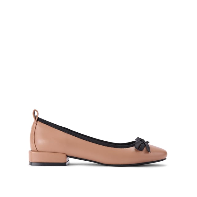The KG Kurt Geiger Marvyn is a camel ballet flat with black bow on the toe and flat block style heel.