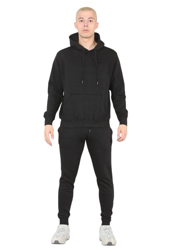 MYT Herren-Trainingsanzug mit Kapuze und Pullover. MYT-Sticklogo auf der Brust und dem linken Bein. Vlies mit gebürsteter Rückseite. Mit gerippter Taille, Bündchen und Kapuze mit Kordelzug. Kapuzenpullover mit Kängurutaschen. Slim-Fit-Jogginghose mit 2-Taschen-Design. Elastischer Bund mit Kordelzug.