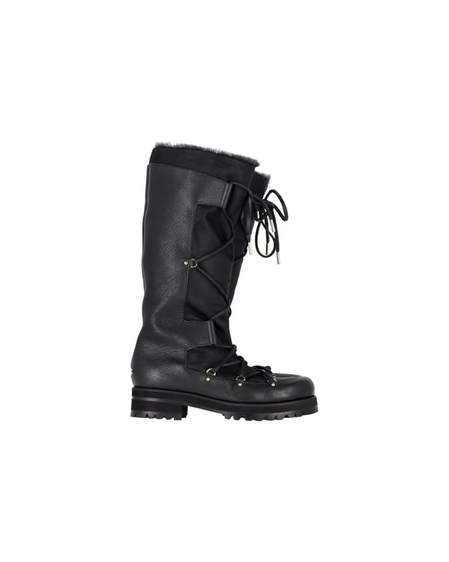 VINTAGE, RRP AS NEW
Conquer winter with the Jimmy Choo Rabbit Fur-Lined Snow Boots in Black Leather. Made from high-quality black leather, these boots offer a durable and stylish option for colder weather. The rabbit fur lining provides ultimate warmth and comfort, making them a cozy choice for even the coldest winter days. 

Jimmy Choo Rabbit Fur-Lined Snow Boots in Black Leather
Material: Leather
Color: Black 
Size: EU38.5
Condition: Excellent
Sign of Wear: No
SKU: 368262