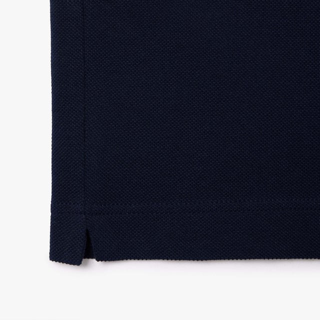 Roland Garros Sport Edition Umpire Polo Shirt Geribbelde polokraag Comfortabele ontspannen pasvorm met rechte mouwen Roland Garros-logo op de borst Co-branded Lacoste x Roland Garros-logo Geborduurde krokodil op de borst