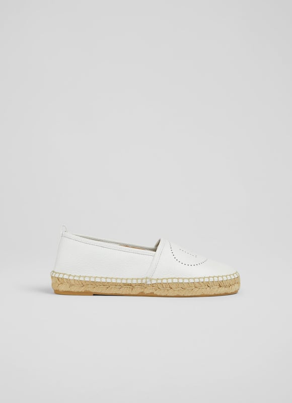 A playful take on the classic flat espadrille, Alexa is a fun everyday summer shoe. Crafted in Spain from super-soft white grainy leather, these round toe espadrilles, have pull-on back tabs, LKB perforation detail to the top of the foot and a woven espadrille sole. Wear them with cotton dresses when the sun shines.