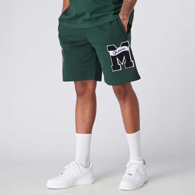 Mens Mercier Academy Shorts in green.- Elasticised waistband.- Open pockets.- Applique logos on leg.- Regular fit.- 65% Cotton  35% Polyester.- Ref: MERC150GREEN