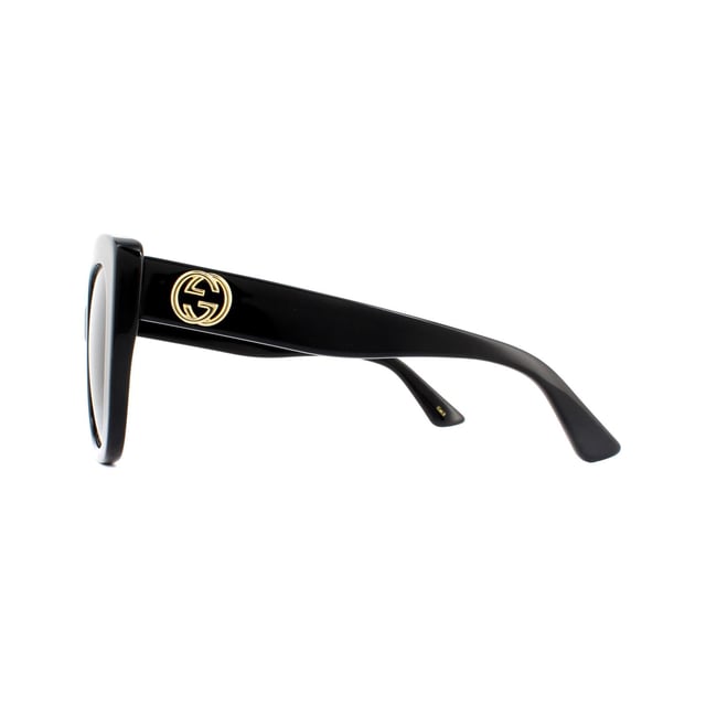 Gucci Sunglasses GG0327S 001 Black Grey Gradient are a bold acetate cat eye style for women. Embellished with the interlocking GG logo on each temple. These sunglasses are guaranteed to make a statement this summer!.