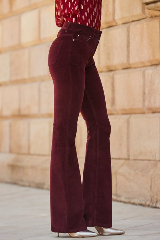 The jeans you never knew you neededKick flare cut makes your legs look so longPlush velvet fabric feels amazingLuxurious wine hueGo cosy with a chunky knit and bootsTake them out-out with strappies and a sparkly topInside leg to fit: Short 29" | Regular 31" | Long 33"