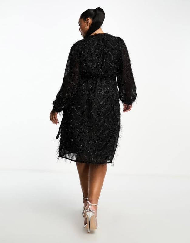 Dresses by Vila Curve Dress the part Textured finish Wrap front Volume sleeves Regular fitSold By: Asos