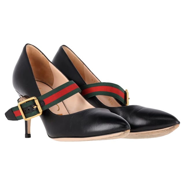 VINTAGE, RRP AS NEW
These Gucci Mary Jane Sylvie pumps exude a timeless appeal. Crafted from leather in Italy, they feature a signature strap with buckle fastening, pointed toes, and 10.5 cm stiletto heels. The white color adds to the appeal of the fashionable pair!


with Dust bag

Gucci Malaga Kid Sylvie High Heel Pumps in Black Leather
Condition: Very good
Signs of wear: Minor markings, Lightly used but very well maintained. Minor mark at soles & creasing, light scuffing at the soles and heels.
Packaging: Dust bag
Color: black
Material: Leather 
Size: EU37/US7
Measurements: Heel height: 80; Insole length: 260
SKU: NAPPUGBSH400613W