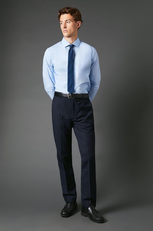 Slim fit design for a modern, tailored silhouette
        Distinctive windowpane check pattern adds visual interest
        Belt loops for versatile styling options
        Tapered leg for a sleek, contemporary look
        Suitable for smart casual to formal occasions
    
    These Burton slim fit trousers present a sophisticated option for the discerning gentleman. The windowpane check pattern introduces a subtle yet stylish element, perfect for those who appreciate classic designs with a contemporary twist. Ideal for smart casual events or more formal occasions, these trousers offer versatility in your wardrobe. Style them with a crisp button-down shirt and polished brogues for a refined office look, or pair with a lightweight jumper and smart trainers for a more relaxed weekend ensemble. The slim fit and tapered leg create a streamlined silhouette that's both flattering and on-trend, making these trousers a go-to choice for the modern man who values both style and comfort in his attire.