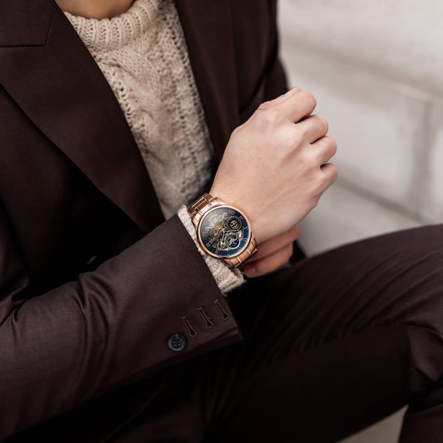COLLECTION: LONGITUDE AUTOMATIC SKELETON
MODEL: ES-8006-44
MOVEMENT: AUTOMATIC SKELETON 
CASE MATERIAL: STAINLESS STEEL
CASE DIAMETER (MM): 44
CASE THICKNESS (MM): 14
CASE SHAPE: ROUND
CASE COLOR: ROSE GOLD
DIAL COLOR: BLUE
BAND: STAINLESS STEEL BRACELET
BAND COLOR: ROSE GOLD
BUCKLE: DEPLOYMENT BUCKLE WITH PUSH BUTTONS
BAND WIDTH (MM): 22
WATER RESISTANCE: 5 ATM
WATCH WEIGHT (G): 150
WARRANTY: 2 YEARS INTERNATIONAL WARRANTY