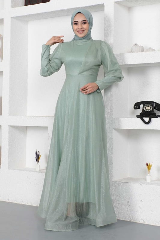Stoffmerkmal: Hergestellt aus glitzerndem Tüllstoff.Produktmerkmal: Neues Hijab-Modestück der Saison. Gefüttert. Mit einem Rückenreißverschluss für einfaches Anziehen. Mit einem Reißverschluss verziert. Aufgrund von Konzeptaufnahmen kann es leichte Farbabweichungen im Produkt geben. Das Model trägt Größe 38. Größe 38 Abendkleid Maße: Produktlänge: 146 cm - Br