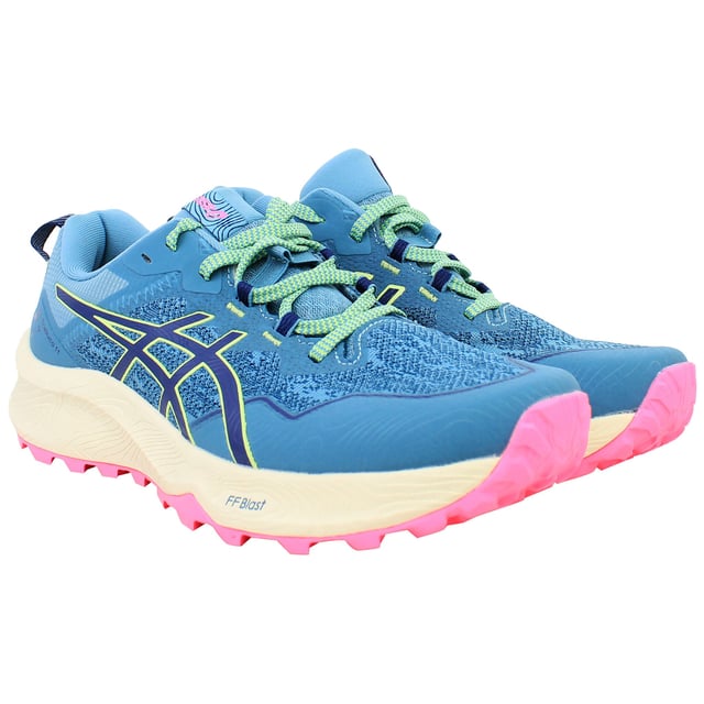 The Asics Gel-Trabuco 11 Women's Blue Running Shoes are engineered for trail runners who demand durability, comfort, and protection on rugged terrains. Combining advanced technology with a stylish blue design, these shoes are perfect for tackling challenging trails with confidence.
Â 
Key Features:
Manufacturer Colour:

Gris Blue/Deep Ocean

FLYTEFOAMÂ® Cushioning: 

Lightweight and responsive midsole foam reduces impact and enhances comfort during long runs.


GELÂ® Technology: 

Positioned in the rearfoot for superior shock absorption, providing smoother transitions and reduced strain on joints.


ASICSGRIPâ„¢ Outsole: 

Trail-specific outsole with multidirectional lugs offers excellent traction on uneven, wet, or rocky surfaces.


Rock Protection Plate: 

Shields your feet from sharp objects like rocks and roots, ensuring safety on rugged terrains.


Engineered Mesh Upper: 

Provides breathability and a secure fit, keeping feet cool and comfortable during high-intensity activity.


Reinforced Overlays: 

Increase durability and offer additional protection against trail debris.


DUOMAXÂ® Support System: 

Enhances stability and reduces overpronation, creating a more balanced and controlled stride.


Eco-Friendly Design: 

Constructed with recycled materials, supporting sustainable manufacturing practices.


The Asics Gel-Trabuco 11 Women's Blue Running Shoes deliver optimal performance, grip, and protection, making them the ideal choice for trail runners and outdoor enthusiasts seeking a reliable and stylish solution for off-road adventures.