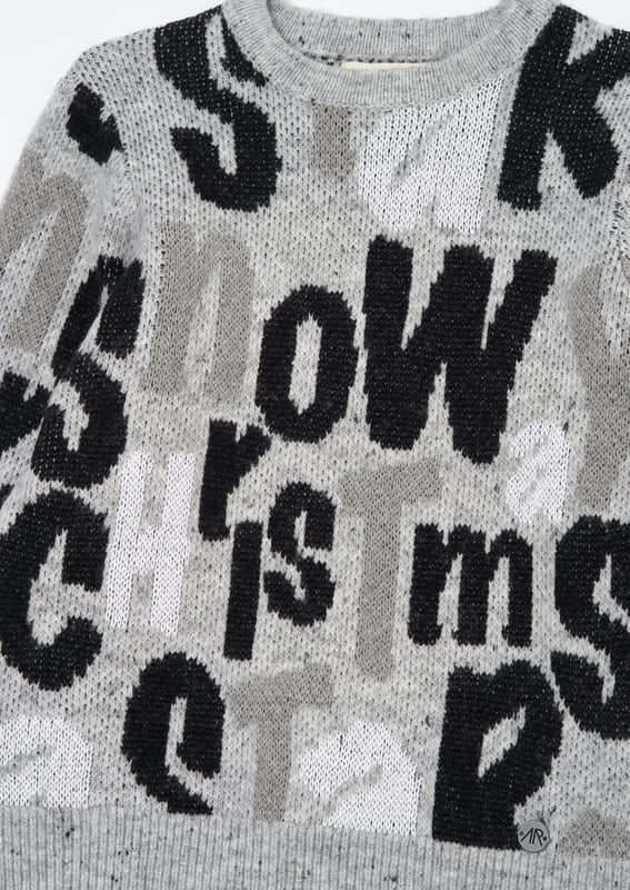 Sleigh the season in style with our ultimate Christmas jumper! Super soft yarn with yuletide text all wrapped up in a cool monochrome intarsia design.