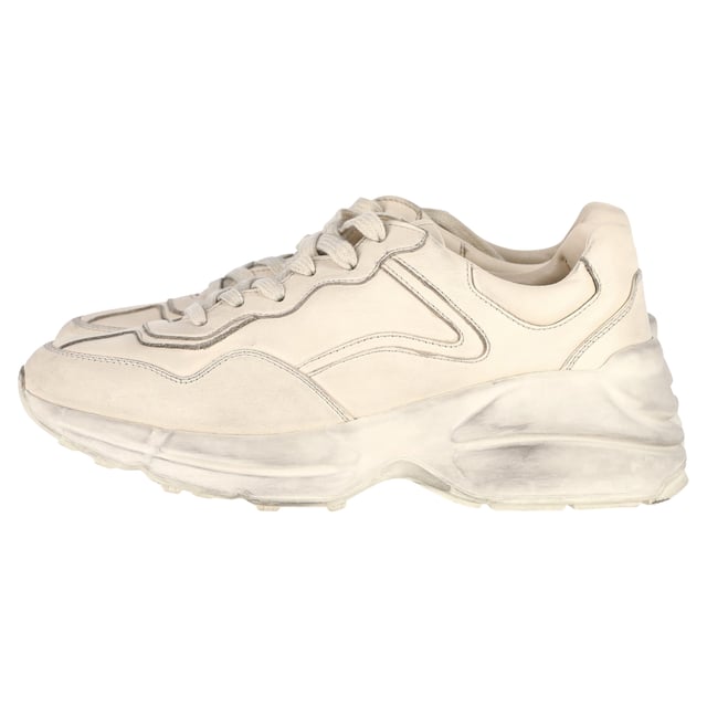 VINTAGE, RRP AS NEW
Luxury with an Edge: Embrace luxury with an edge in the Gucci Distressed Rhyton Sneakers in White Leather. The high-quality leather and distressed finish create a unique juxtaposition of elegance and ruggedness. These sneakers are ideal for individuals who seek a luxurious yet effortlessly laid-back footwear option that makes a statement.

Gucci Distressed Rhyton Sneakers in White Leather
Condition: Very good
Signs of wear: Include Box., Minor markings, Lightly used but very well maintained. Minor mark at soles & creasing, light scuffing at the soles and heels.
Packaging: Box, Dust bag
Color: White | ecru
Material: Leather
Size: EU37.5
Measurements: Heel height: 50; Insole length: 280
SKU: NAPPUGBSH370869W