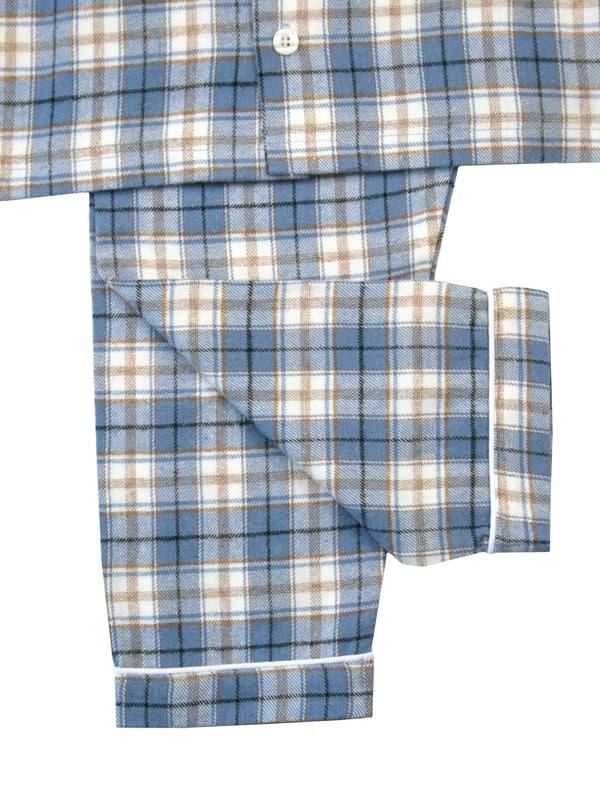 Boys blue check cotton pyjamas blending comfort and style seamlessly. These cosy pyjamas, made from soft, breathable cotton, are prefect for a restful night's sleep or casual lounging. The timeless faded denim blue with caramel and ivory check adds a touch of charm and sophistication to betimes making it a delightful experience for your young lad. Step into a world of comfort and fashion with these classic pyjamas, designed for your boy's relaxation and peaceful nights sleep!