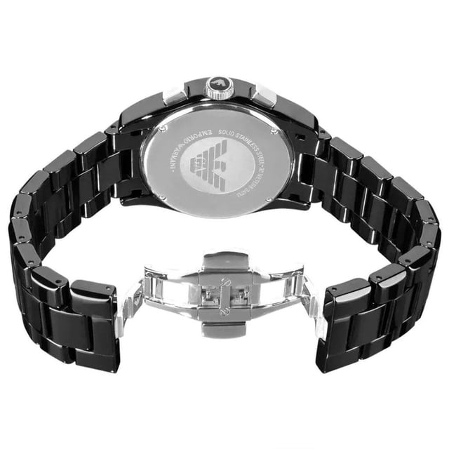 Japanese Made Quartz Chronograph Movement. 43mm x 11mm Black Polished Ceramic Case. Solid Stainless Steel Caseback and Crystal Set Bezel. Push-Pull Crown. Black Mother of Pearl Dial. Luminous Stainless Steel Hands and Arabic Numbered Indexes. Date At 4 O'Clock. 3 Sub-Dials. 21mm Width Black Ceramic Bracelet with Hidden Deployment Clasp. Water Resistant to 30 Meters 3ATM. This watch is , comes with the correct Box and Paperwork and 2 Years International Warranty.
