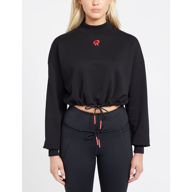 Created by women for women  Red Run are passionate about creating activewear that fits your body and lifestyle. Making sure you feel and look good whatever your day entails  Red Run use only the best in luxurious and breathable materials  ensuring you feel comfortable and confident with every step. They present to you the Inky Collection which includes the Crop Sweatshirt in a black colourway  the perfect activewear essential. Details: black colourway  cotton construction  ribbed funnel neck  ribbed cuffs  adjustable draw tie hem  relaxed fit  tonal stitching and contrast branding to the chest to complete.