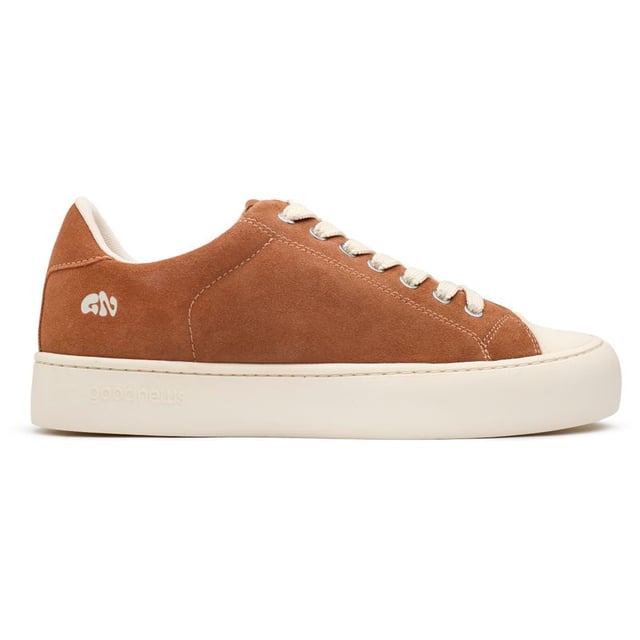 Step Up Your Eco-game With The Good News Slimer Trainers. Sporting A Sleek Tan Hue, These Court-inspired Kicks Boast A 100% Recycled Mesh Lining, Ensuring Your Steps Tread Lightly On The Planet. Crafted With Breathable, Cushioned Footbeds And A Unique Round-toe Shape, They Offer Unmatched Comfort. The 100% Copper Eyelets Add A Refined Touch, While The Robust Rubber Soles Promise Enduring Style. Stride With Pride In These Sustainable Standouts That Don't Compromise On Looks Or Values.