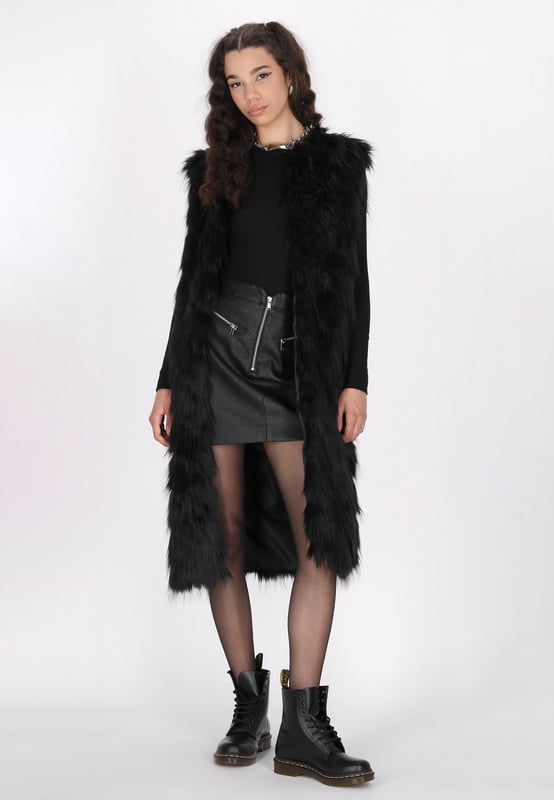Dieses luxuriöse ärmellose Oberteil mit einer weichen, fellähnlichen Textur strahlt Raffinesse und Stil aus. Der gerade Saum und der offene Kragen machen es perfekt zum Layern über Outfits für zusätzliche Wärme oder als schickes Fashion-Statement. Das schlichte, aber elegante Design betont die strukturierte Oberfläche und Silhouette und schafft einen auffälligen Look, der sowohl vielseitig als auch modisch ist.  Weste