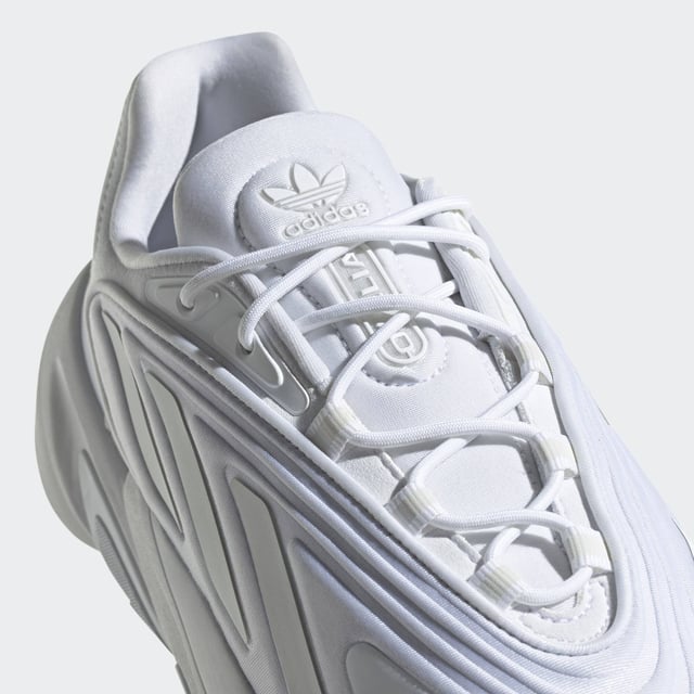 adidas may be a long way from the '90s, but these Ozelia Shoes are rooted in that loud, experimental era. Inspired by the adidas archives, the bold trainers have a chunky build that's all about being noticed. They're sleek with a fast look, and when your days are fast-paced, the Adiprene cushioning helps out on the comfort side of things.This product is made with recycled content as part of adidas' ambition to end plastic waste. 20% of pieces used to make the upper are made with minimum 50% recycled content.  - Snug fit - Lace closure - Textile upper - Hugs the foot - Adiprene cushioning - Rubber outsole - 25% of the components used to make the upper are made with a minimum of 50% recycled content  Shipped by adidas