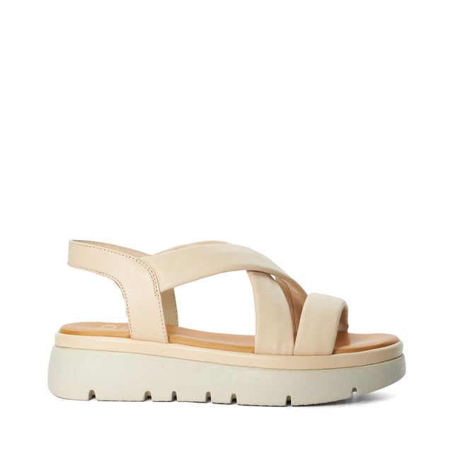 Dune Ladies Lounge - Chunky Leather Sandals Slide into our effortlessly stylish Lounge sandals. The leather straps cross over the front of the foot, and we love the directional look of the trend-led tractor sole. Complete with a square toe the contrasting leather sole is ultra-smooth and features our bespoke Dune London logo, making this style a covetable choice for any woman's summer sandal collection.