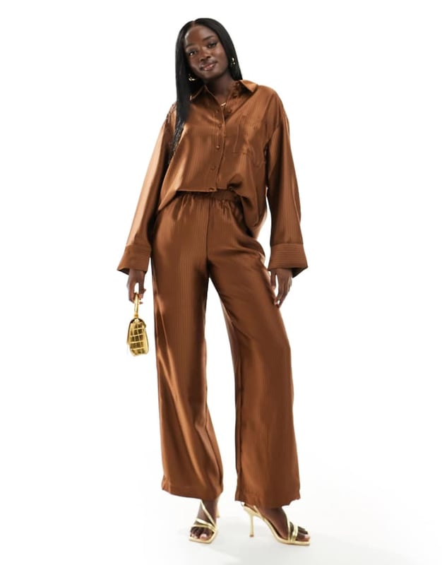 Trousers & Leggings by Y.A.S Part of a co-ord set Shirt sold separately High rise Elasticated waistband Wide legSold By: Asos