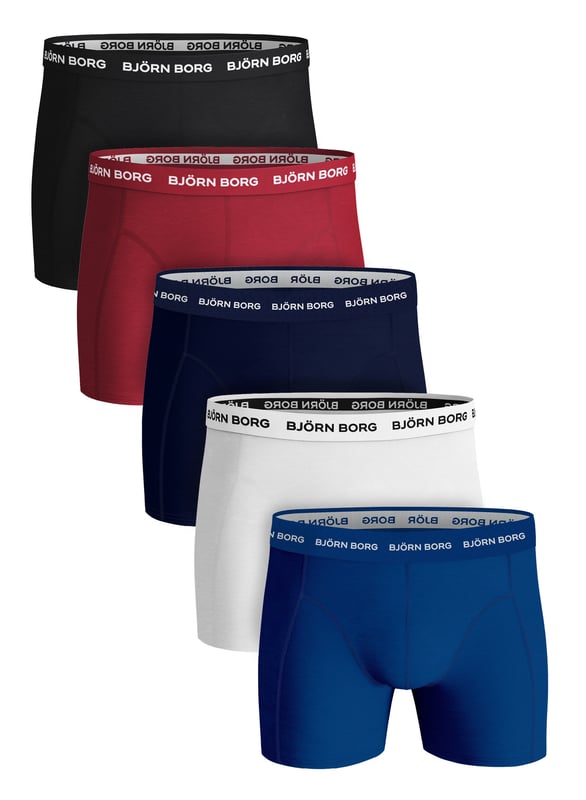 Björn Borg - Men’s 5 Pack Luxury Cotton Stretch BoxersIf you're looking to add a touch of luxury to your daily routine, look no further than these Björn Borg Men's Boxers. Made from soft cotton fibres, these boxers are the perfect everyday essential. The cotton blend is engineered to be as comfortable as it is durable, so you can wear them time and time again without worrying about fading or sagging. The soft elastic waistband gives you a secure fit and the mid-rise design means they're perfect for everyday wear.They have a comfort stretch fit and great value for money, so you can feel good about investing in yourself. The stretch fabric is designed to provide a snug fit that helps prevent any chafing or irritation.These boxers are perfect for both work and play, making them an ideal choice for topping up that underwear drawer. They come in 4 different colour/style options which are: All Black, Black & White Waistband, Solid Colours & Coloured Waistband.These boxers are made from: 95% Cotton, 5% Elastane and come in 4 sizes: Small, Medium, Large & X-Large. They come in 5 pairs per pack, making them great value for money and they are Machine Washable.Extra Product DetailsBjörn Borg Men’s BoxersSoft Cotton Fibres5 Pairs Per PackComfort Stretch FItGreat Value For MoneyMedium Leg LengthMid Waist RiseSoft Elasticated WaistbandAn Everyday Essential4 Colour Options95% Cotton 5% ElastaneAvailable in: S, M, L & XLMachine Washable