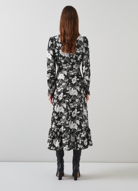 LK Bennett Winona Dresses, Black/Cream Embrace a night of elegance with the Winona mono meadow print jacquard dress. This black silk mix beauty features a sophisticated floral design, complete with back buttons, a zip, and a timeless crew neck. Pair it with your favourite heels or statement jewellery for a truly captivating look.