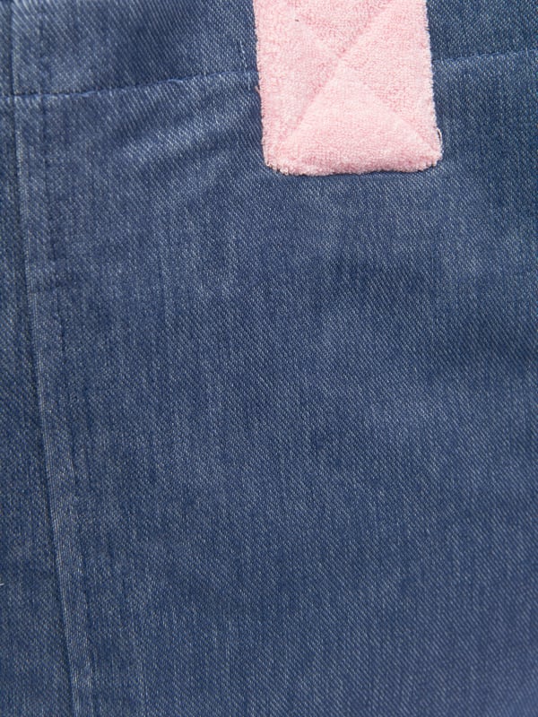 Carry life's essentials in style with this blue tote bag from AY by Ayla. The denim style piece exhibits a chic demeanour, elevating any look. Pink fleece handles are soft on skin and create a cute contrast. Pair with any other AY blue or pink garments for a cool coordinated look.